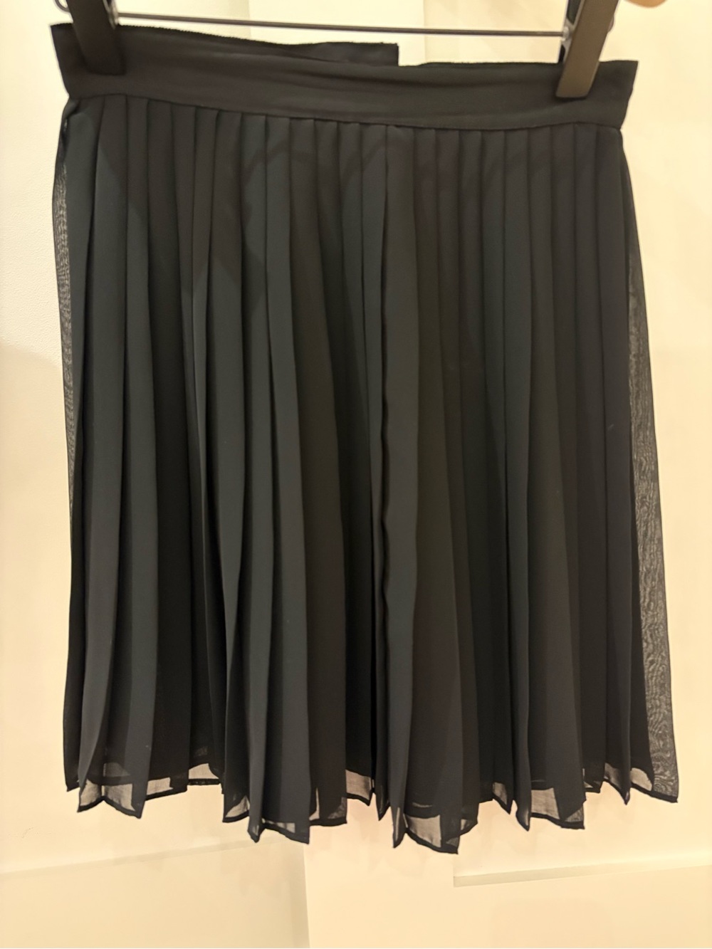 Club Monaco pleated skirt with cross grain ribbon waistline.